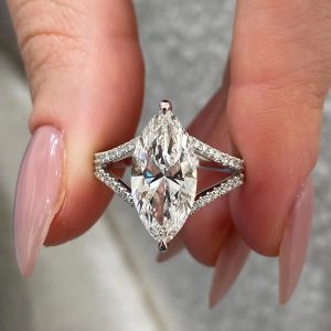 Marquise engagement ring with pavé split shank and open frame setting