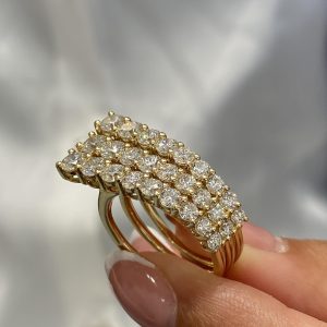 Triple row band ring set with round diamonds in three parallel lines