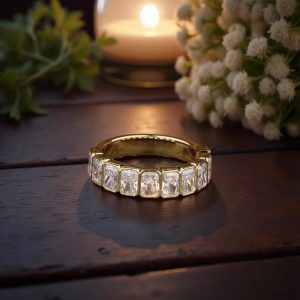 Bezel set eternity band with rectangular cushion stones