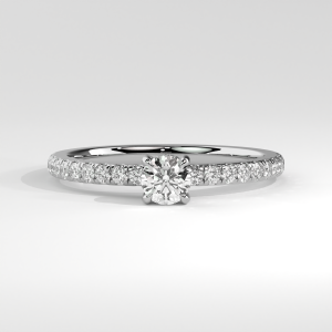 Round solitaire engagement ring with pavé diamond band and open gallery