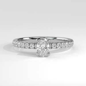 Oval solitaire engagement ring with pavé diamond band and basket gallery