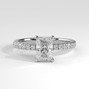 Radiant cut solitaire engagement ring with pavé-set band, four prongs, and open gallery