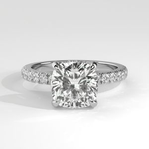 Cushion diamond engagement ring with hidden halo and pavé shank