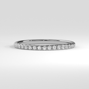 Slender eternity ring with round stones in a shared prong setting