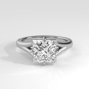Princess cut solitaire engagement ring with cathedral setting and open basket design